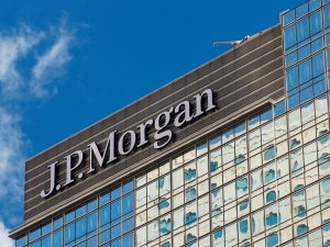 JPMorgan Chase is developing a blockchain-based digital deposit token to speed up cross-border payments, according to sources.