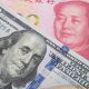 us dollar chinese china yuan currency bills brics