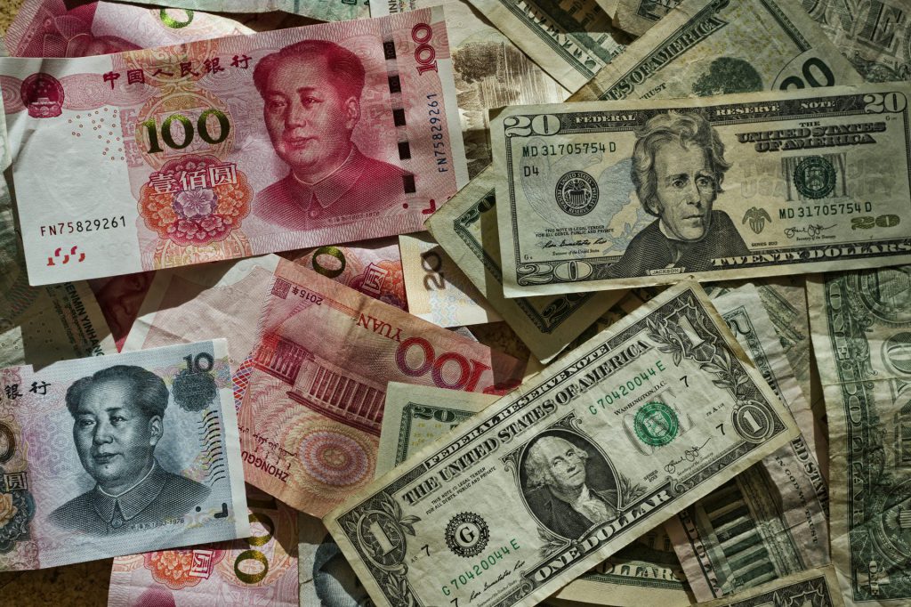 Yuan and dollar banknotes