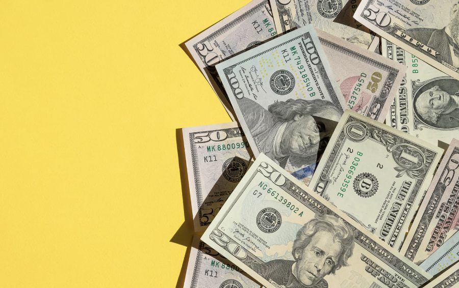 cash on yellow background