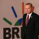 Turkey's Erdogan in front of a BRICS poster