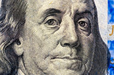 closeup image benjamin franklin bill finance us dollar usd currency