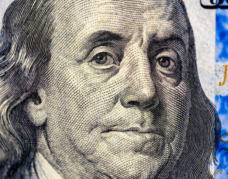 closeup image benjamin franklin bill finance us dollar usd currency