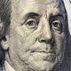 closeup image benjamin franklin bill finance us dollar usd currency