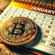 Bitcoin on a calendar and desk