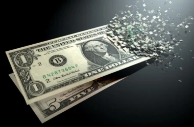 US dollar bill disintegrating into pixels representing fragmentation