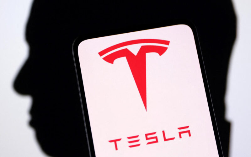 Tesla logo displayed on smartphone screen