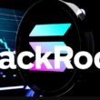 BlackRock logo with financial chart display in background