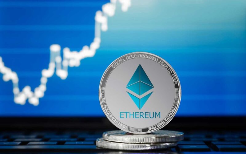 Ethereum coin with upward price chart in the background