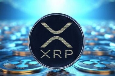 XRP coin with logo displayed against blue digital background