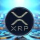 XRP coin with logo displayed against blue digital background