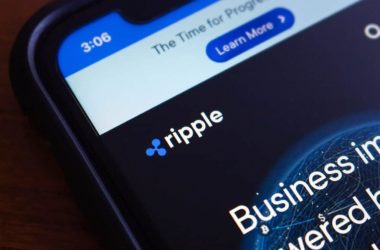 Ripple logo displayed on smartphone with financial interface
