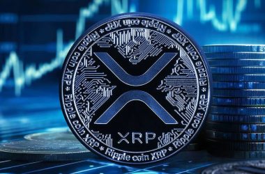 XRP cryptocurrency coin with its symbol displayed prominently against a blue background showing rising stock market charts and stacked coins, representing the digital asset at the center of Franklin Templeton's ETF filing