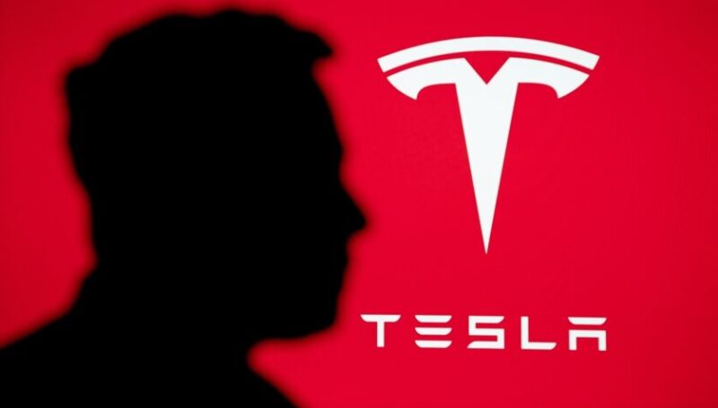 Tesla logo on red background with silhouette shadow