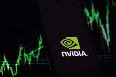 NVIDIA logo with stock market chart in green on dark background
