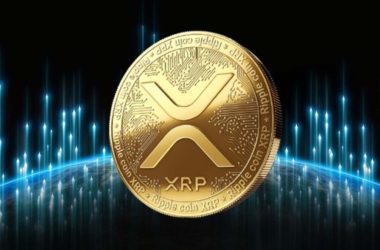 Golden XRP cryptocurrency coin displaying the distinctive 'X' symbol against a dark background with blue digital light effects, representing Ripple's digital asset