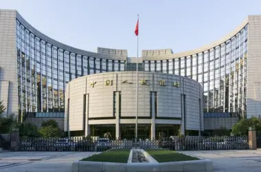 People's Bank of China headquarters building with red flag