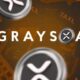 Grayscale logo with XRP coins on financial document background