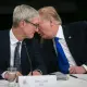 Trump whispers to Tim Cook