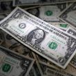 dollar on bed of dollars