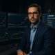 Professional financial analyst at modern trading desk with multiple screens showing Bitcoin charts and US government wallet addresse