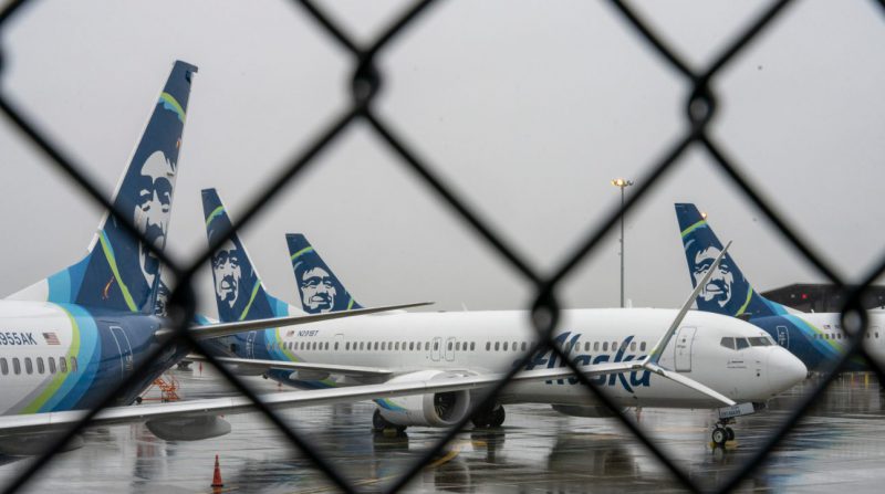 Alaska Airlines planes grounded thorugh chain fence
