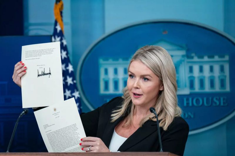 Karoline Leavitt holding trade letter 2