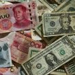 YUAN AND DOLLAR BILLS