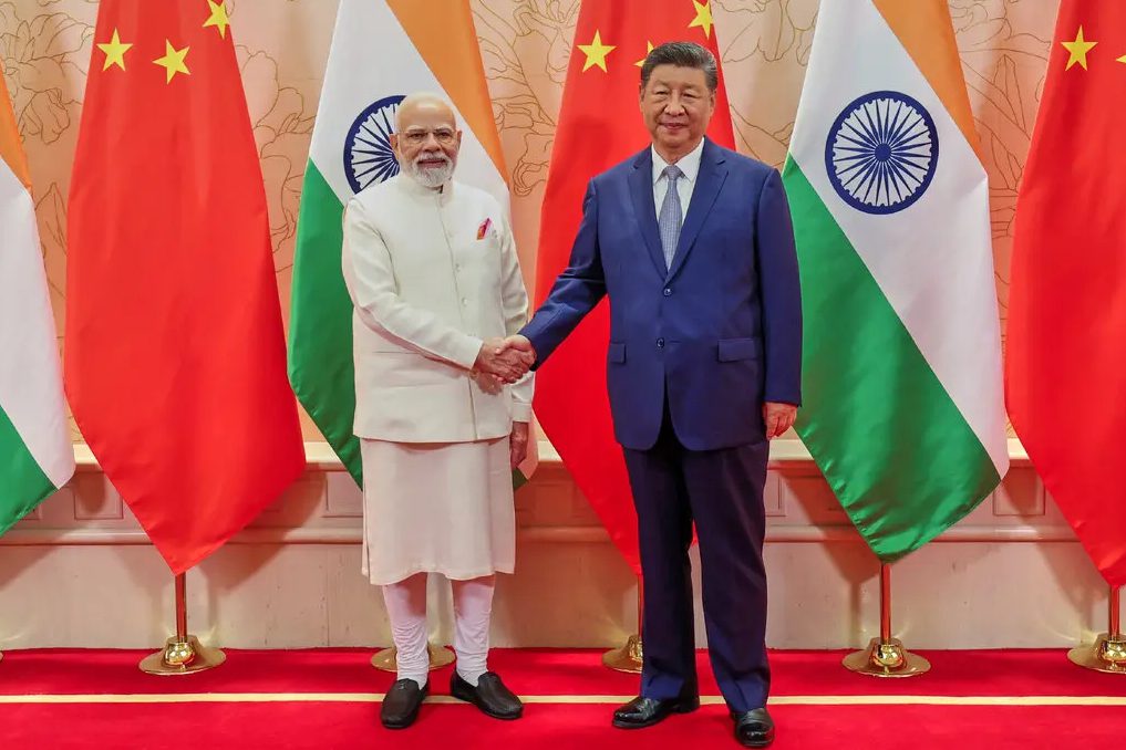 Prime Minister Narendra Modi and President Xi Jinping handshake