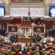 Wide view of French National Assembly hemicycle during voting session