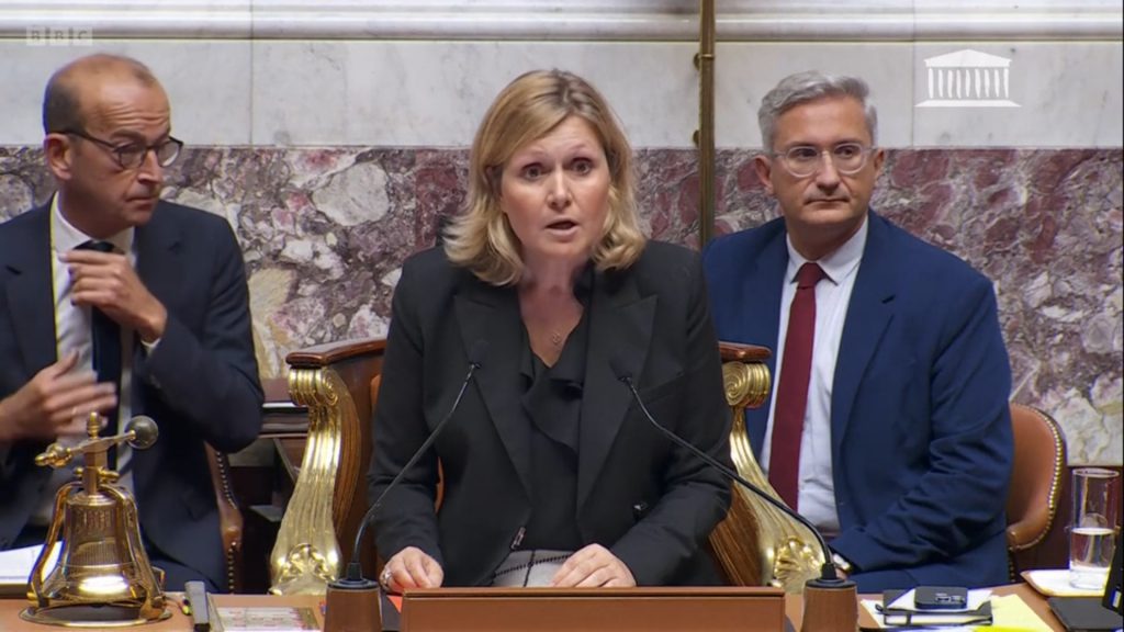 French National Assembly President Yaël Braun-Pivet announces vote results at podium